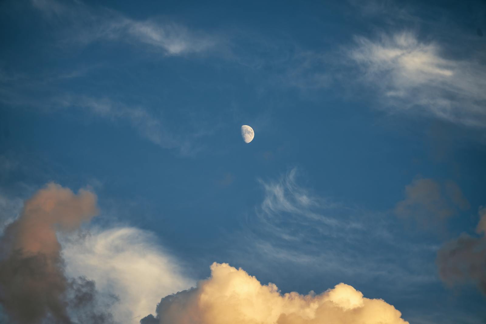 Beautiful moonlit sky with wispy clouds, captured in Pepin, Wisconsin.