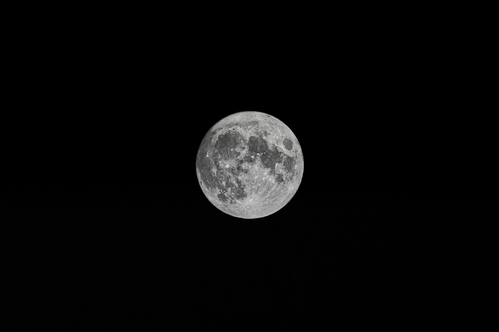 full moon on black background